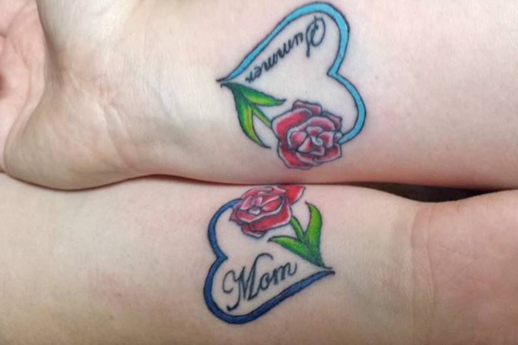 Daughter And Mom With Rose Flowers Tattoos On Forearms