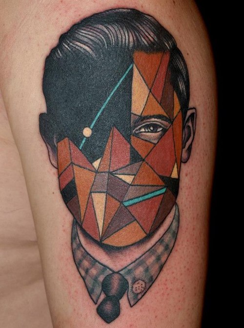 Distinctive Face Mosaic Tattoo On Half Sleeve
