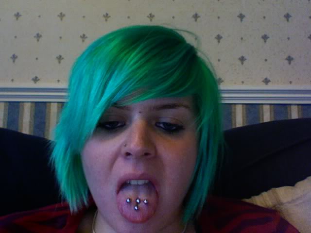 Emo Girl With Multiple Tongue Piercing