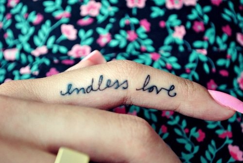 Endless Love Tattoo On Finger Side