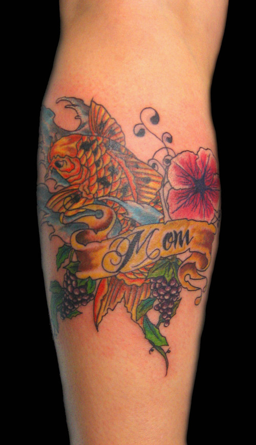 Fish With Mom Banner And Flower Tattoo On Arm