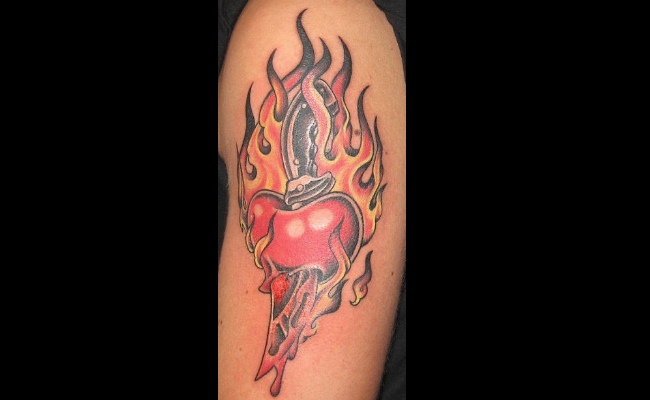 Flaming Heart And Dagger Tattoo