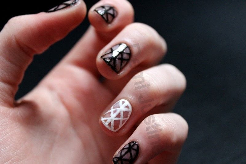 Freehand Black And White Negative Space Nail Art For Short Nails