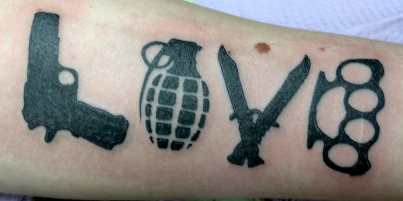 Gangsta Weapons Love Tattoo On Forearm