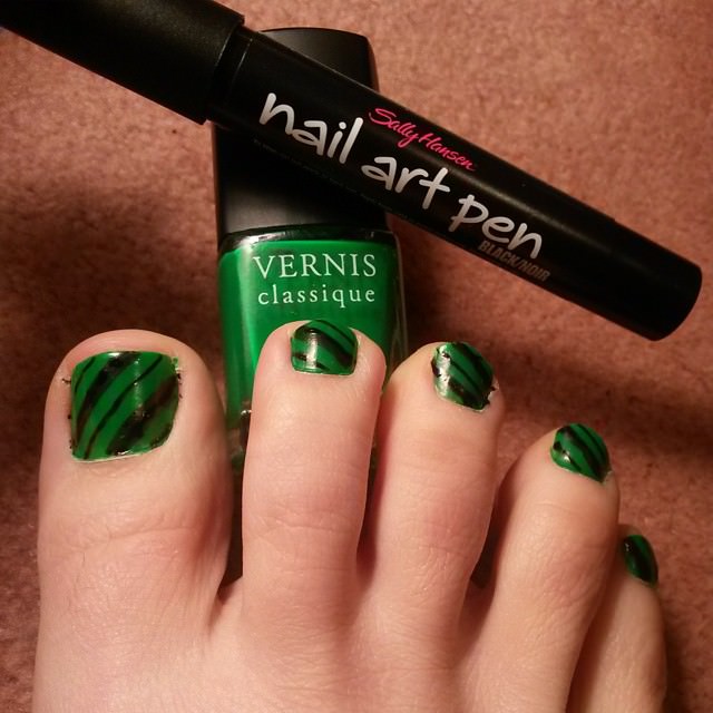 Green And Black Stripes Nail Art For Toe Nails