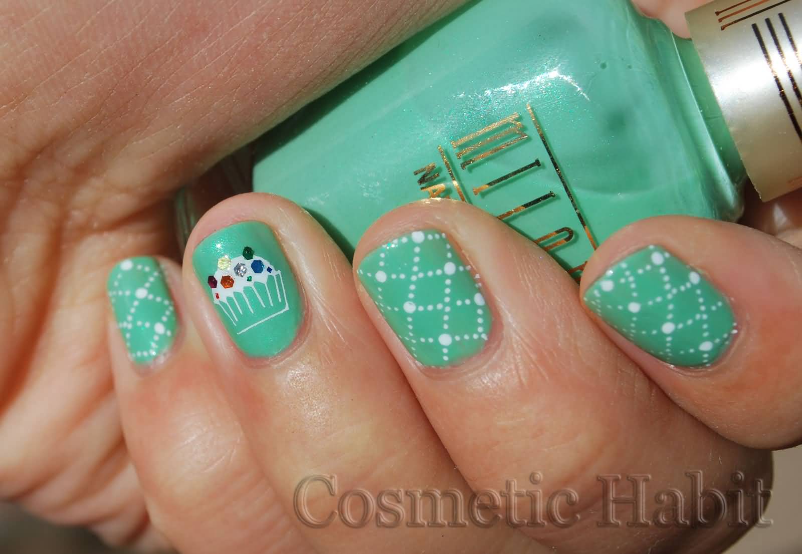 Green Base Nails With White Dots And Accent Cupcake Nail Art