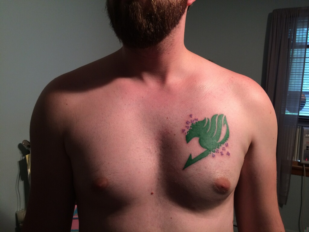 Green Fairy Tail Logo Tattoo On Chest