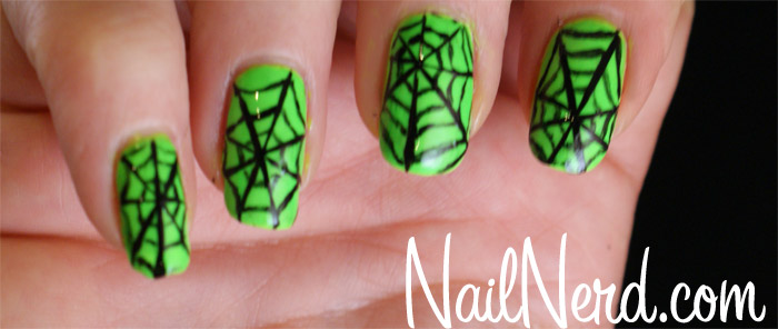 Green Nail Art With Spiderweb Design