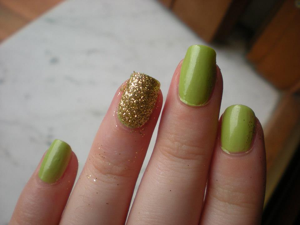 Green Nails With Accent Gold Glitter Design