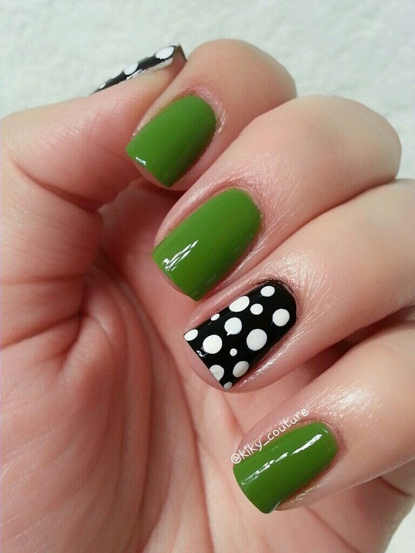 Green Nails With Black And White Polka Dots Nail Art