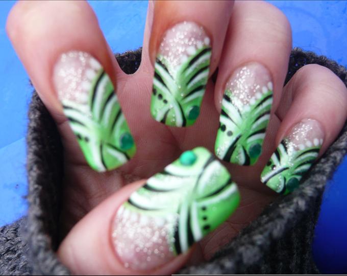 Green Nails With Black And White Stripes Design Nail Art