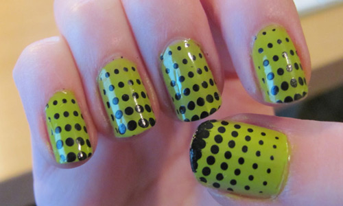 Green Nails With Black Polka Dots Nail Art