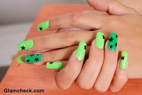 Green Nails With Black Stars Design Nail Art Idea