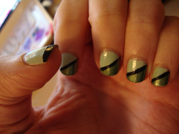 Green Nails With Black Stripes Nail Art