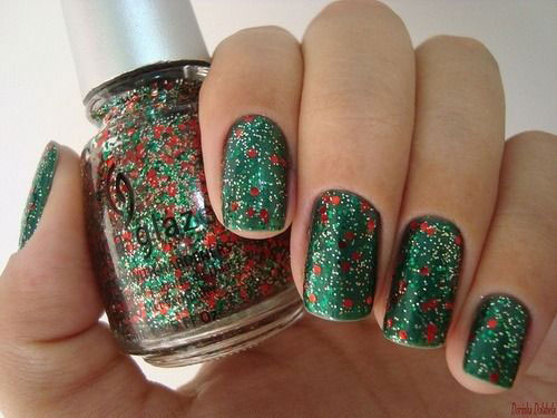 Green Nails With Gold Sparkle And Red Dots Nail Art