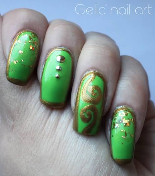 Green Nails With Gold Spiral Design Nail Art