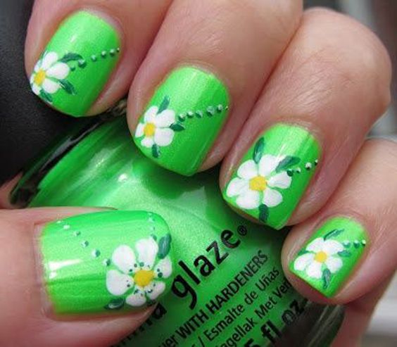 Green Nails With White Flowers Nail Art
