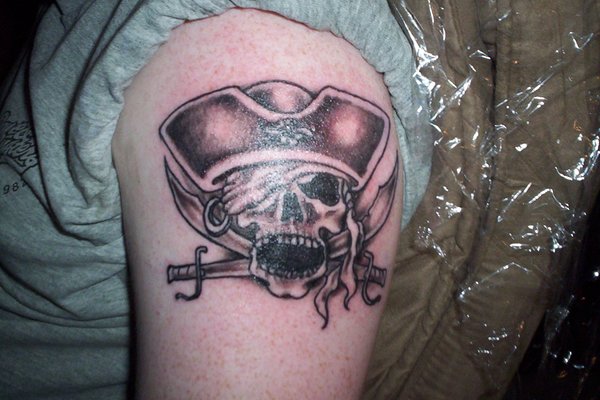 Grey Captain Jolly Roger Tattoo On Left Shoulder