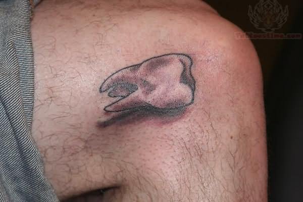 Grey Ink Molar Tooth Tattoo On Thigh