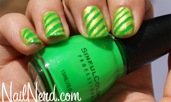 Irish Green Nails With Golden Diagonal Stripes Design