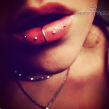 Labret Piercing With Ring And Horizontal Lip Piercing