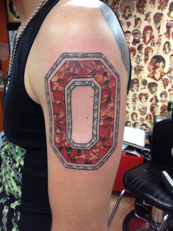 Large Block O In Mosaic Style Tattoo On Left Half Sleeve