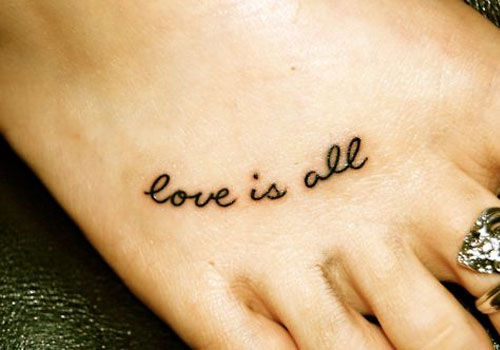 Love Is All Tattoo On Foot