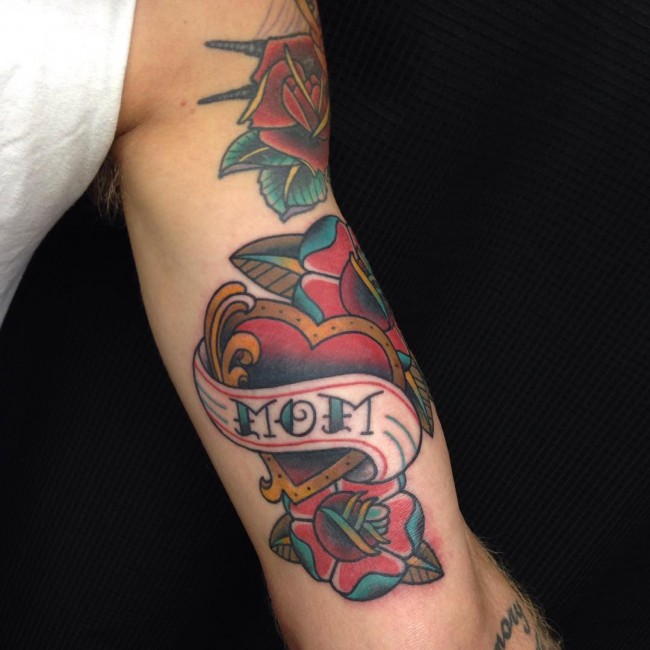Love Mom With Rose Flower Traditional Tattoo On Biceps