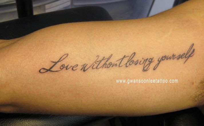 Love Quote Tattoo On Biceps