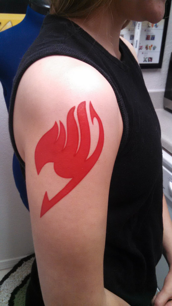 Lovely Red Fairy Tail Logo Tattoo On Right Shoulder
