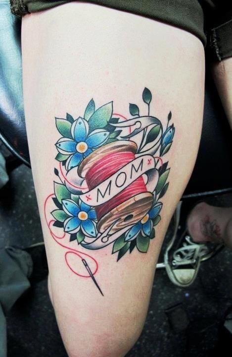 Mom Banner With Spool Traditional Tattoo On Thigh