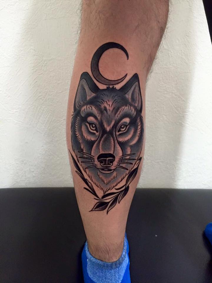 Moon And Wolf Head Tattoo On Back Leg