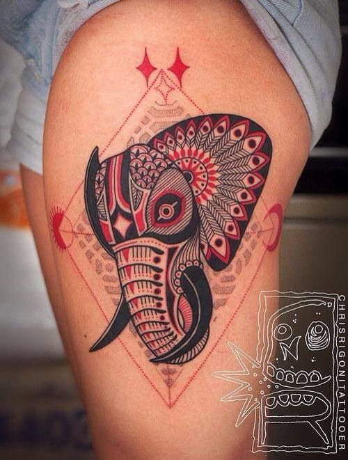 Mosaic Elephant Face In Diamond Shape Tattoo On Thigh