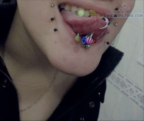 Multiple Tongue Piercing With Colorful Barbells