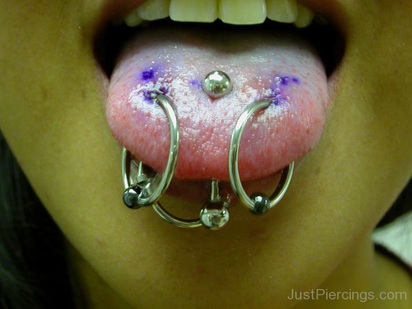 Multiple Tongue Piercing With Silver Bead Rings And Silver Barbell