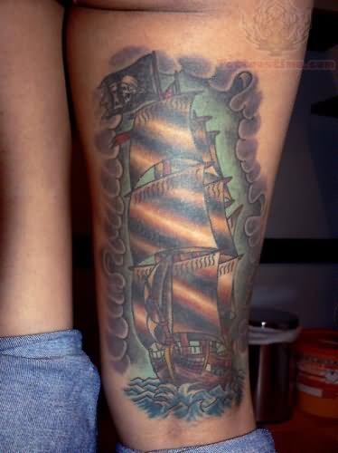Nice Colored Jolly Roger Ship Tattoo On Back Leg