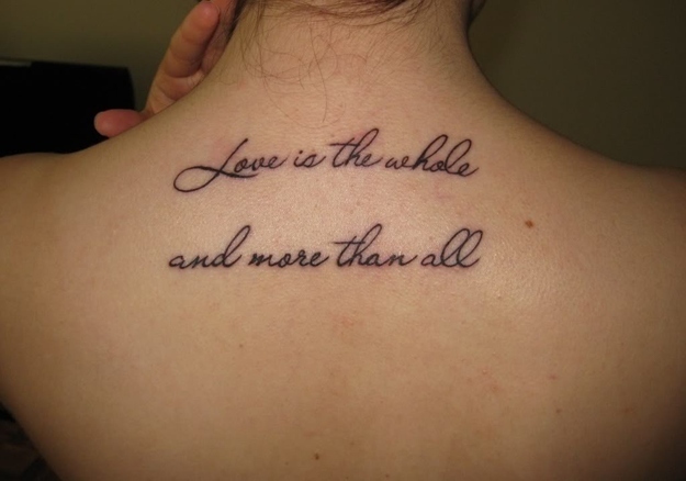 Nice Love Quote Tattoo On Upper Back