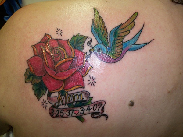 Nice Memorial Mom With Rose Flower Tattoo On Upper Back
