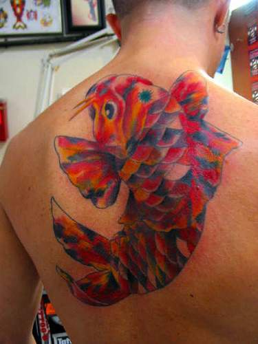 Nice Mosaic Koi Fish Tattoo On Upper Back