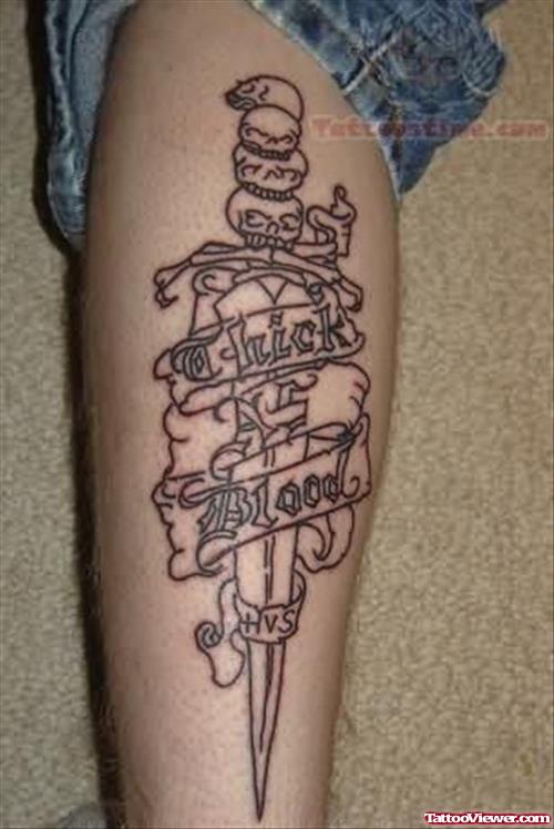Nice Skull Dagger Tattoo On Leg
