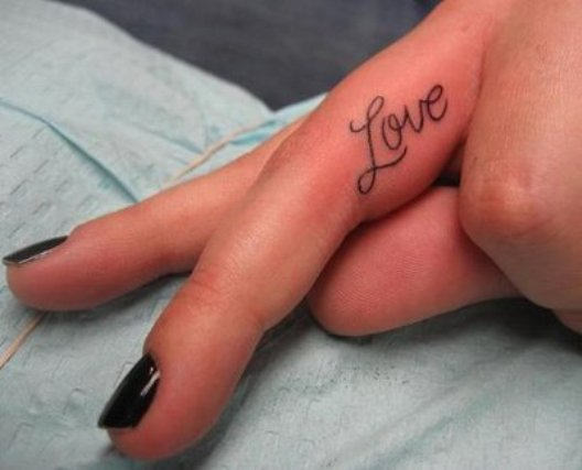 Nice Small Love Tattoo On Finger