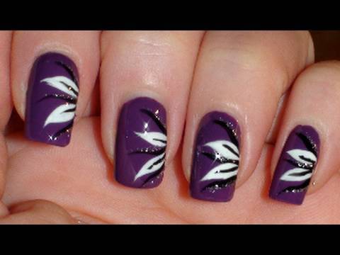 Purple Nails With Black And White Flower Nail Art
