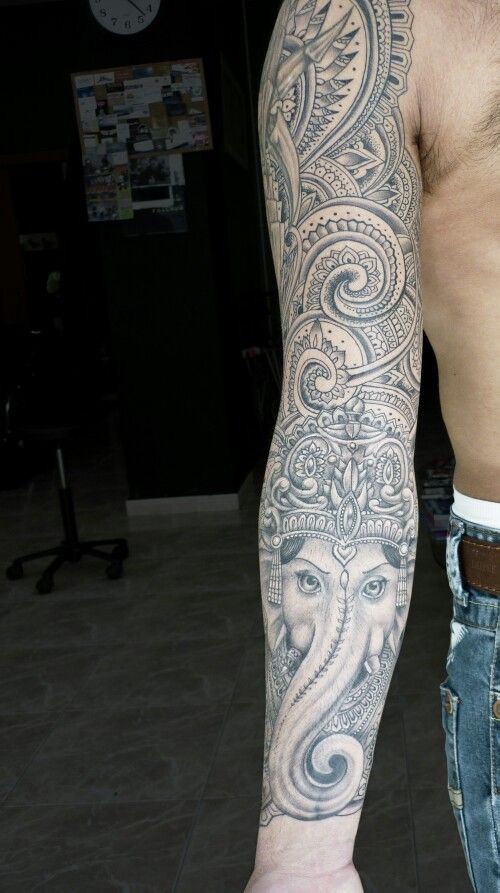 Realistic Ganesha And Paisley Pattern Tattoo On Full Sleeve For Men