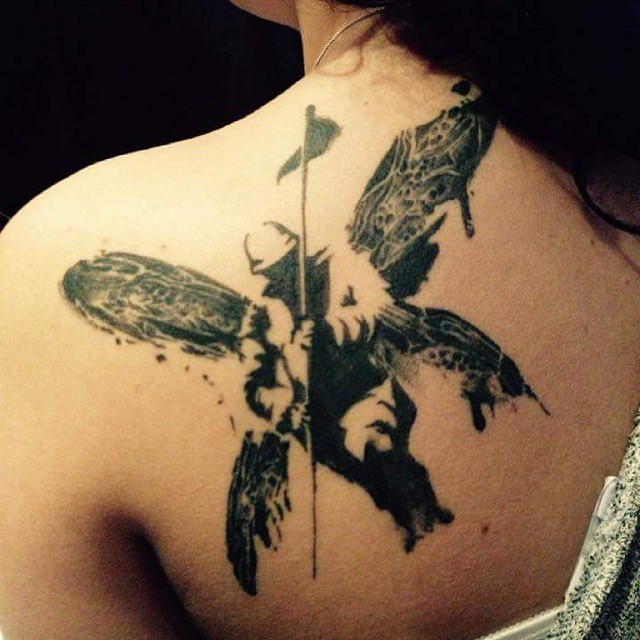 Realistic Linkin Park Soldier Tattoo On Upper Back For Girls