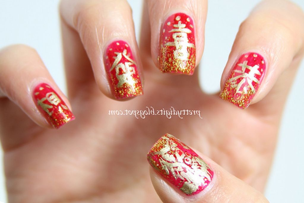Red Nails With Golden Chinese Symbols Design Nail Art