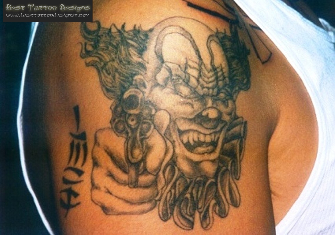 Scary Gangsta Clown Face Tattoo On Right Shoulder