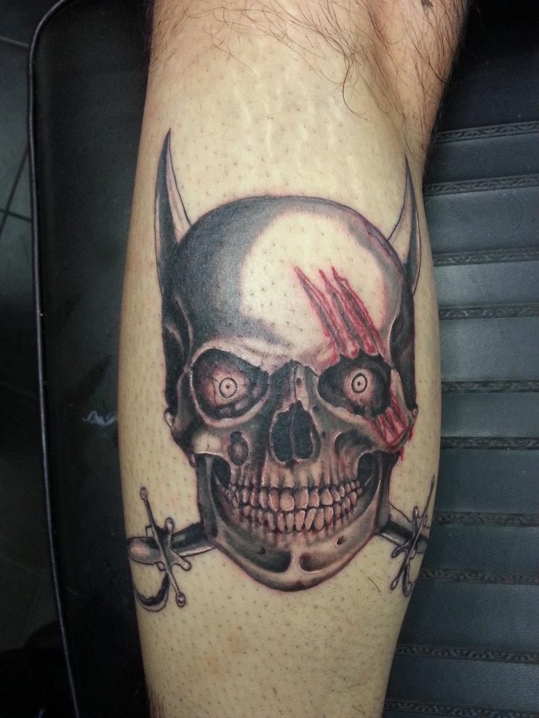 Scary Jolly Roger Skull Having Horns Tattoo
