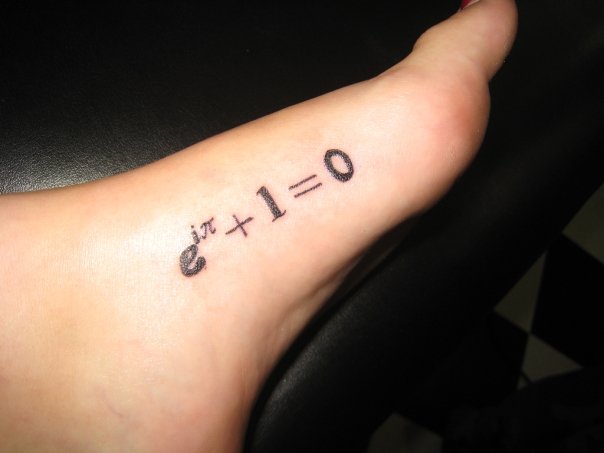 Short Black Math Formula Equation Tattoo On Foot