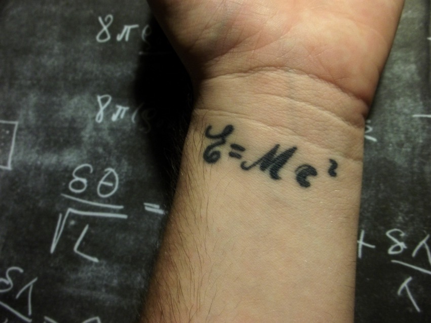 Short Einstein Equation Tattoo On Wrist
