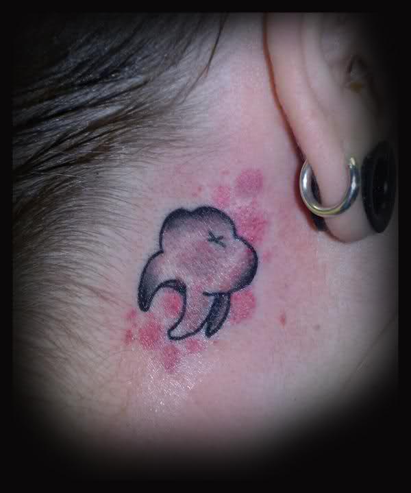 Simple Molar Tooth Tattoo On Behind Ear For Girls